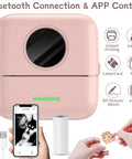 No Sweat Portable Mini Sticker Printer And Slick Inkless Thermal Maker With Effortless Bluetooth Sync For Quick Journaling Labels Study Flashcards And Casual Diy Wall Decals In Fresh Pink on white background with USB cable and paper roll.
