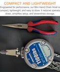 Industrial Mini Manual Chain Hoist With 1100 Lbs Capacity And 10 Foot Lift, shown with pliers, compact design and GS certified.