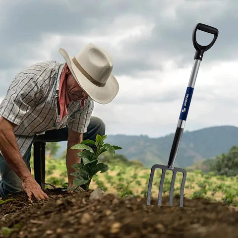 Gardener using 4-Tine Spading Digging Fork with D-Grip Handle, rugged garden tool for breaking up soil, forged steel, 41 inch length