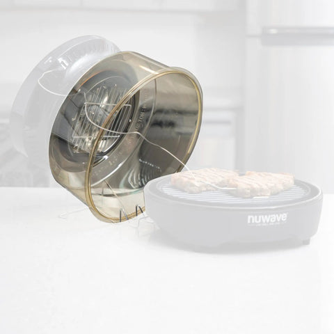 Power Dome Replacement Part For Primo Grill Oven, vented dome shown detached next to grill, NuWave branding visible.