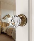 Antique Brass Crystal Door Knob Set For Interior Privacy Doors With Push Button Lock And Emergency Release shown on bedroom door