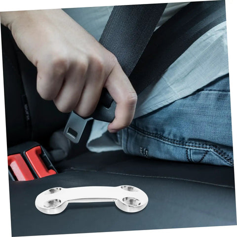 Hand using Heavy Duty Polished Fastener Plate Fixing Buckle With Multi Functional Design For Industrial Maintenance to secure seatbelt.