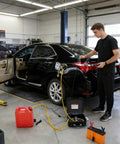 No Sweat 12V 75W Electric Gas Fuel Transfer Pump Set in use with red gas can and dual car adapter in automotive garage.