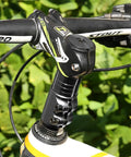 Adjustable 1-1/8 Inch Aluminum Bike Stem Riser Extender on mountain bike handlebar, boosting bar height with 28.6mm clamp.