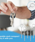 4 In 1 Eyeglasses Screwdriver Kit With Keychain Portable 6 Piece Precision Repair Set shown attached to keys