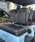 Slick Four Seater Electric Golf Cart Boasting Ridiculously Comfy Luxury Seats And Knobby Antislip Tires With A Sharp Hd Led Display For A Real Smooth Weekend Ride In Light Blue interior view showing luxury seats and steering wheel.