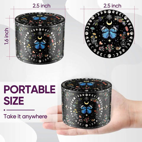 Black Manual Spice Grinder For Kitchen Use with butterfly and moon design, shown on hand for size reference