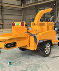Mobile Wood Chipper Shredder For Forestry And Yard Waste Cleanup Beast Of A Heavy Duty Branch Crusher with dual exhausts.
