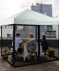10x10 Mosquito Net With Zipper For Patio Gazebo And Canopy Tent installed on rooftop with people inside