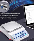 Heavy Duty Electronic Hydrostatic Balance Scale With Crisp Lcd Panel And Sturdy Metal Tray Built Legit For Dead On Precise Density And Volume Testing Up To Five KG Capacity showing RS-232 interface and LCD display.