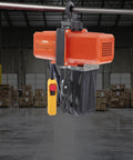 VEVOR electric chain hoist with orange housing and black chain bag, yellow wired remote, installed on overhead crane.