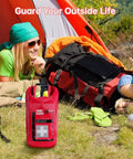 Must Have Waterproof Emergency Kit For Boating And Outdoor Adventures in red bag at campsite with tent and backpacks.