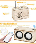 DIY Bluetooth Speaker And FM Radio Kit For Kids Aged 8 To 12 with wooden case, labeled FM radio components, and wireless phone connection.