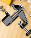 Heavy Duty Mini Work Bench Vise With Adjustable Quick Release Clamp for secure material handling on wood surface.