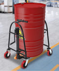Pro Grade Heavy Duty Manual Furniture Movers With Sturdy Rolling Wheels 1300 Lb Load Capacity transporting a red barrel.
