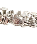 Heavy Duty Quarter Inch Chicago Screws 10 Pack Nickel Plated Floral Engraved Turnbuckle Fasteners close-up view.