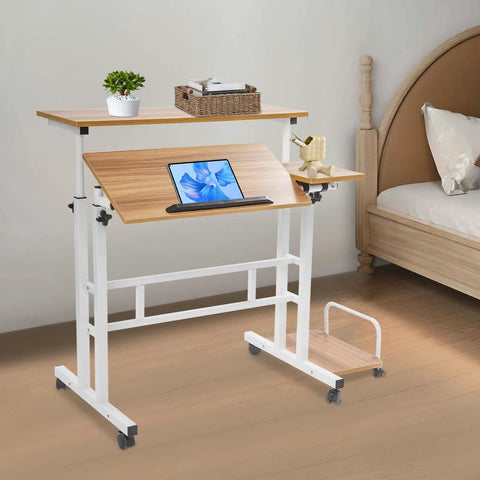 Effortless Folding Standing Desk With Smooth Rolling Casters And Tilted Writing Panels For Total Flex Work From Home Setup Featuring Quick Height Adjustments In Modern Light Walnut And White, shown in a bedroom setting.