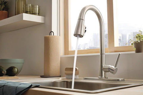 Precept Pull-Down Kitchen Faucet, 1.5 GPM Flow, Stainless Finish, 3-Function Sprayer With POWERinse in modern kitchen setting