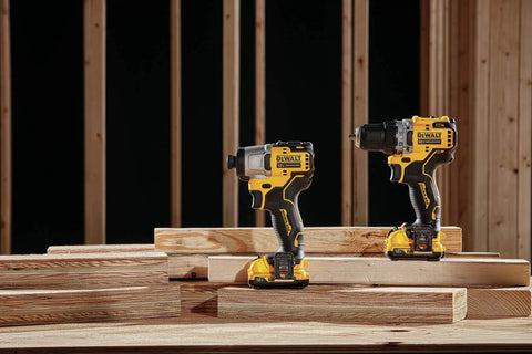 Xtreme 12V Max Brushless Drill And Impact Driver Combo Kit With Three Eighth Inch Ratcheting Chuck on wooden planks