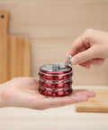 Person using Beast Of A Portable 2.5 Inch Hand Crank Grinder With Clear Top Cover, Large Aluminum Alloy Herb Grinder, in hand