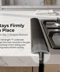 25 Inch Silicone Gap Filler For Stove And Counter High Heat Resistant Kitchen Gap Cover Matte Black Dishwasher Safe Easy Clean No Mess Between Stove And Counter shown secured between stove and counter.