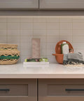 Kitchen scene with Six Inch Matte Black Cabinet Pulls Set Of 25 Stainless Steel Square Drawer Handles on brown cabinets.