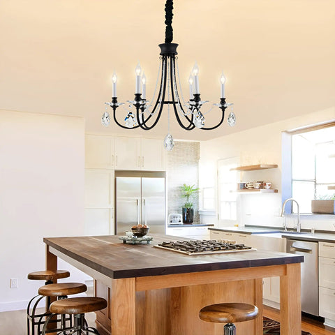 6 Light Black Crystal Chandelier With Chic Farmhouse Rustic Black Metal Frame hanging in a modern kitchen setting.
