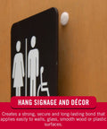 Heavy Duty Adhesive Hook And Loop Dots For Smooth Surfaces Medium Black 3/4 Inch Circles 200 Pack on a door for hanging signage.