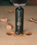 Close-up of Absolute Game Changer 25 Pc Woodworker Drill Bit Set featuring self-centering cutter on wood.