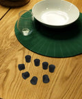 Anti Slip Rubber Feet for Furniture 8 Pack Thickened Grippy Floor Protectors on wooden table with dish and glass