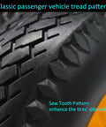 Close-up of 4.10/3.50-4 solid tire replacement with saw tooth tread pattern, 10 inch wheel for hand trucks and garden carts.