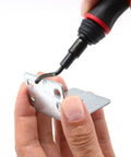 Extendable neck deburring tool with 3 extra swivel blades deburring metal plate edge close-up