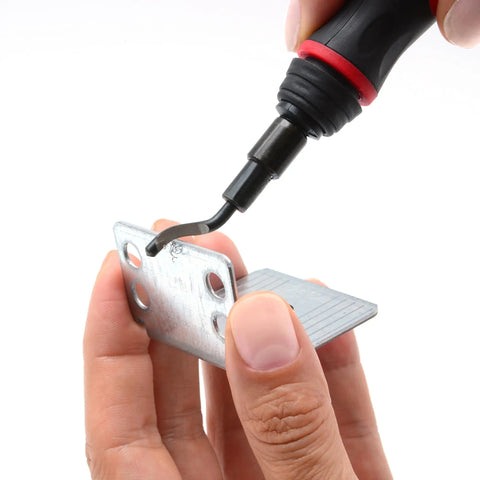 Person using the Super Easy Reach Extension Deburring Tool With 16 HSS Swivel Blades on a metal plate.