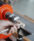 Crush Complex Turns On Your Lathe With This Badass ER32 Collet Chuck Kit featuring a lathe in use, showing precision wood shaping.