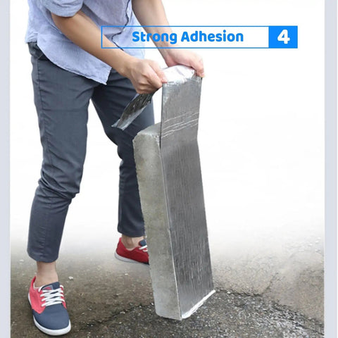 Person demonstrating the Top Tier Heavy Duty Asphalt Roofing Tape With Aluminum Foil To Seal Leaks And Patch Cracks On Gutters Or Shingles Straight Up Waterproof Flashing Underlayment Roll That Really Gets The Job Done Fast.