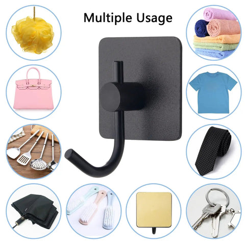 12 Pack Heavy Duty Adhesive Wall Hooks Aluminum Towel Hangers For Hanging Coats Hats Towels Robes Keys And Clothes Stick On Wall Mounts For Kitchen And Bathroom Black, demonstrated with various household items around a central black hook.