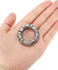 Hand holding Bike Ball Crank Bearing 38mm 7 Balls 4 Pack Stainless Steel Bicycle Bearings Replacement Front And Rear Parts For Bike Repairs Silver Get Your Ride Rolling