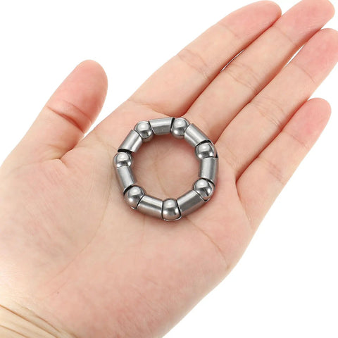 Hand holding Bike Ball Crank Bearing 38mm 7 Balls 4 Pack Stainless Steel Bicycle Bearings Replacement Front And Rear Parts For Bike Repairs Silver Get Your Ride Rolling