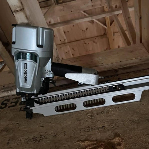 Top Shelf Pneumatic Framing Nailer With Smooth Operator Depth Tweaks And Heavy Duty Aluminum Magazine for snag free shooting of 21 degree collated nails.