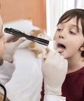 Doctor using Rechargeable Pen Flashlight With USB Charging Ultra Compact 5.7 Inch EDC Light on child for throat examination.