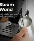 Close-up of CraftBrew Digital Espresso Machine With 15 Bar Pump And Steam Wand For Lattes And Cappuccinos frothing milk.
