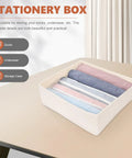 Foldable Beige Closet Storage Basket Straighten Your Space Fast Soft Polyester Cotton Linen Drawer Organizer For Socks Undies And Ties Keep The Mess Low Key Neat on a table.