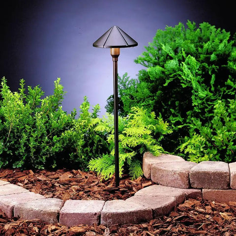Six Groove Path And Spread 1 Light 12V Landscape Light With Textured Architectural Bronze Finish Wet Location Rated Center Mount Design Bulb Included 22.75 In H By 6 In W Lightweight 2 Lb Outdoor Fixture For Walkways And Gardens with lush greenery background