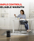 Woman in office with 360 Degree All Around Heat Portable Space Heater With Adjustable Thermostat And Two Heat Settings