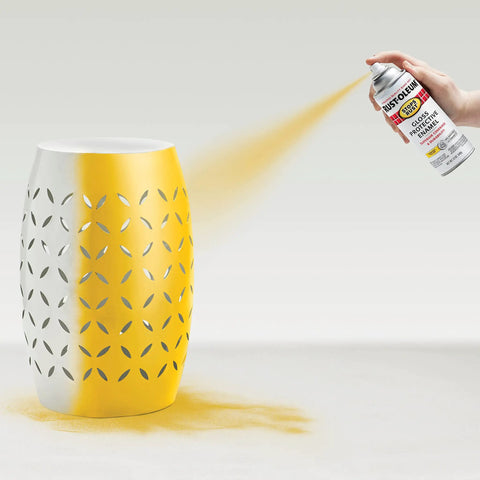 Tough As Nails Rust Eliminating Oil Based Spray Paint With Smooth Gloss Sunburst Yellow Finish for indoor ceramic vase being spray painted.