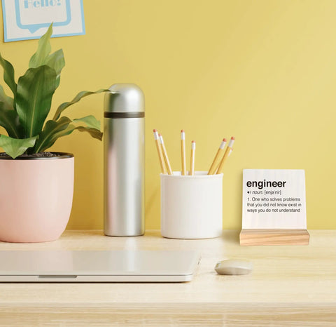 Engineer Definition Wood Plaque Sign Gift For Engineers on desk with plant and stationery