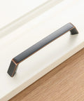 10 Pack 5 Inch Oil Rubbed Bronze Cabinet Pulls Set For Kitchen Cabinets Drawers Dresser Vanity Cupboard installed on white cabinet
