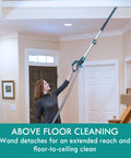 Person using Intuition Lift Up Bagged Upright Vacuum With Two Motor Power Suction And HEPA Filter No Touch Bag Tech to clean ceiling corners