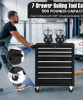 7 Drawer Metal Rolling Tool Chest On Wheels With Locking System in garage workshop, man pushing cabinet on rubber wheels