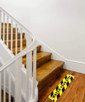 Two Pack Watch Your Step Floor Stickers Anti Slip Safety Decal 6X24 Inch on wooden stairs with yellow and black design.